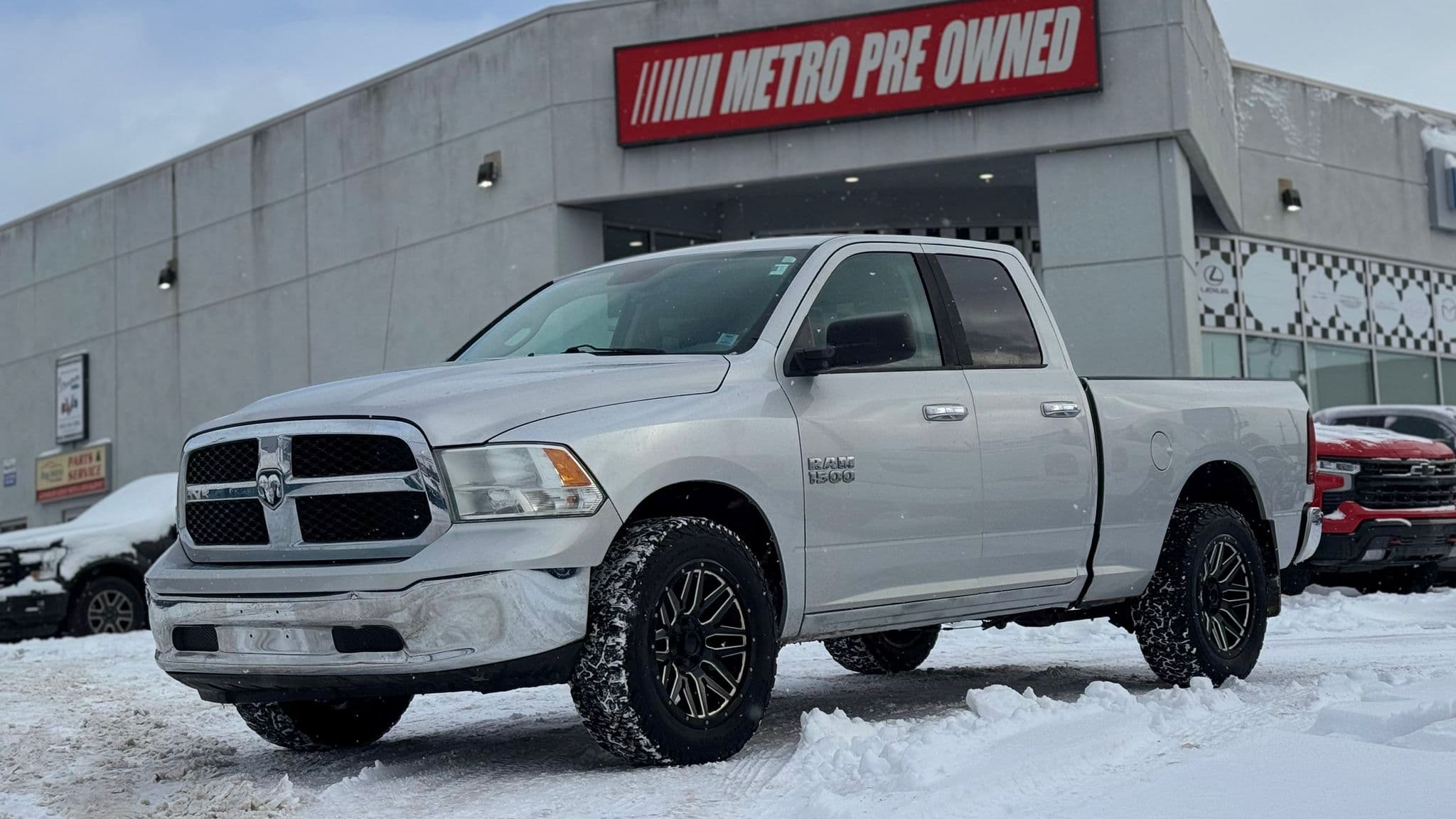2015 Ram 1500 SLT 4WD Quad Cab 140.5" 5.7L V8